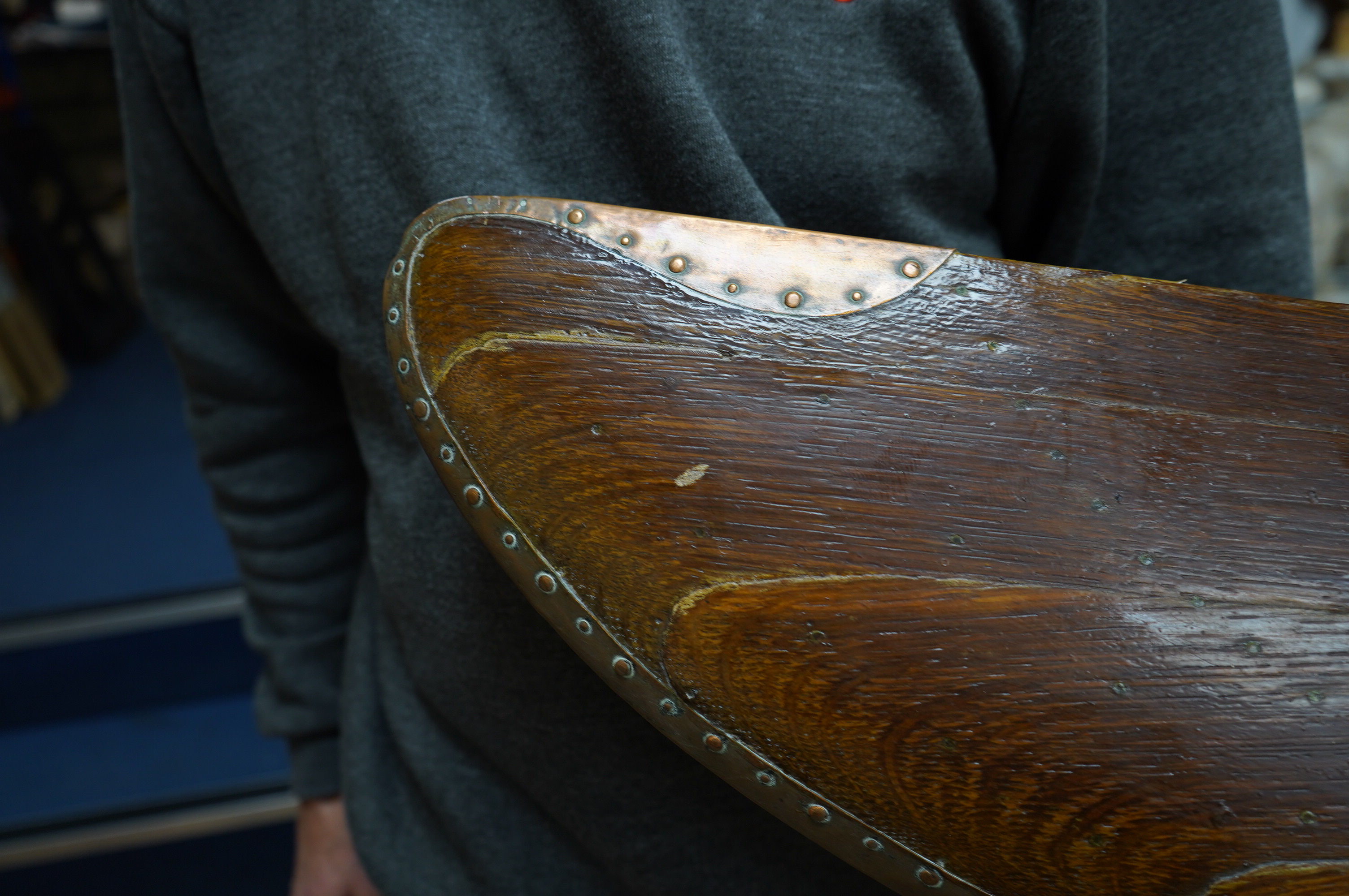 An early 20th century American laminated oak propeller with copper clad blade edges, Paragon stamp to the blade, 251cm wide. Condition - good